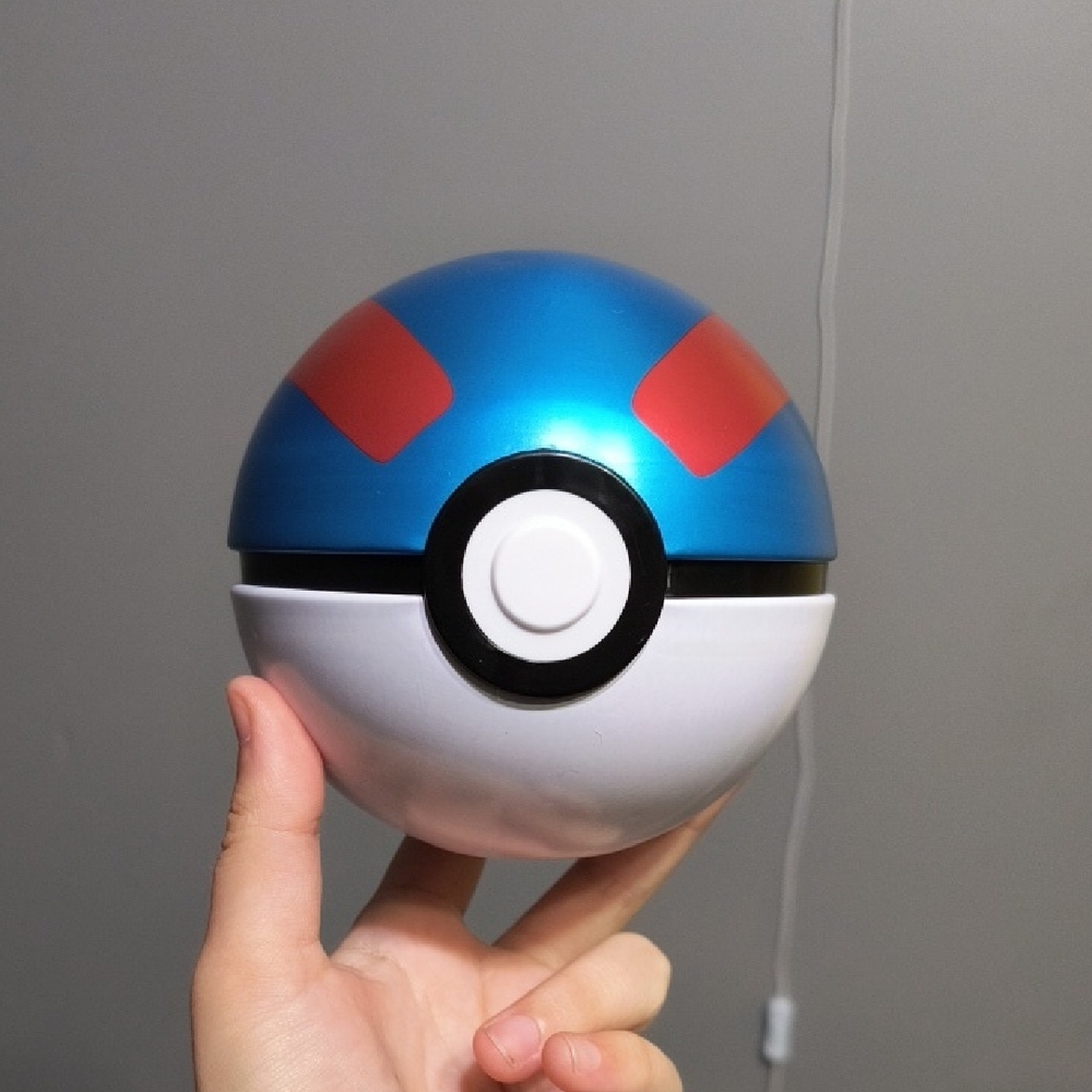 Blue and White Poké Ball Collector Toy